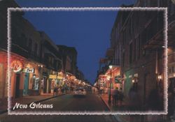 New Orleans Illuminated Street Scene at Night Postcard