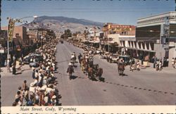 Main Street Parade with Horse-Drawn Carriages, Cody, Wyoming Postcard