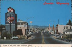 Lander, WY Main Street, Purina Mill, One Shot Antelope Hunt Postcard