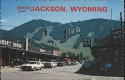 Jackson, Wyoming Street Scene with Ski Slopes Postcard