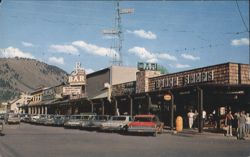Jackson WY Street Scene with Ranch Shops & R Bar Postcard