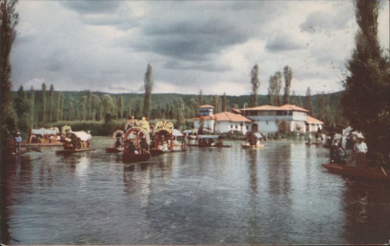 Xochimilco Trajineras on Canal with Buildings, Mexico