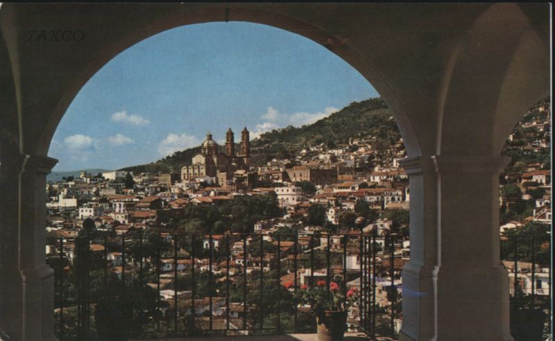 Panoramic View of Taxco, Mexico through Archway