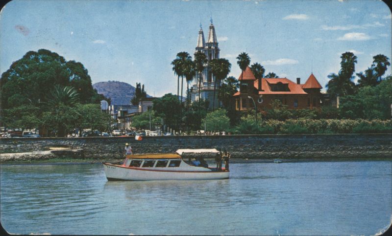 Boat on Lake Chapala with Church and Buildings JAL Mexico