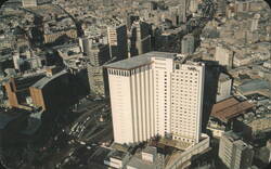Air View of Columbus Circle and Fiesta Palace Hotel Postcard