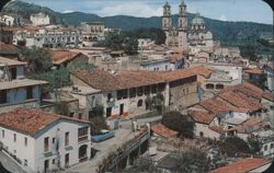 Panoramic View of Taxco with Santa Prisca Church Towers Postcard