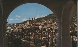 Panoramic View of Taxco, Mexico through Archway Postcard