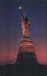 Statue of Liberty Illuminated at Dusk Postcard