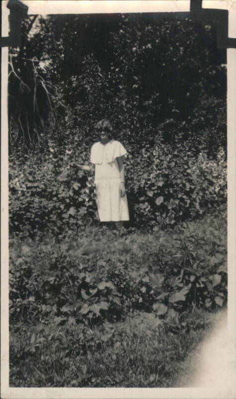 Woman in White Dress in Lush Foliage Photographs & Snapshots