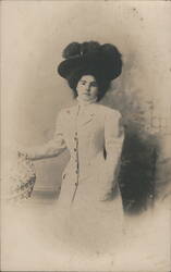 Woman in Large Feathered Hat and Striped Coat Postcard