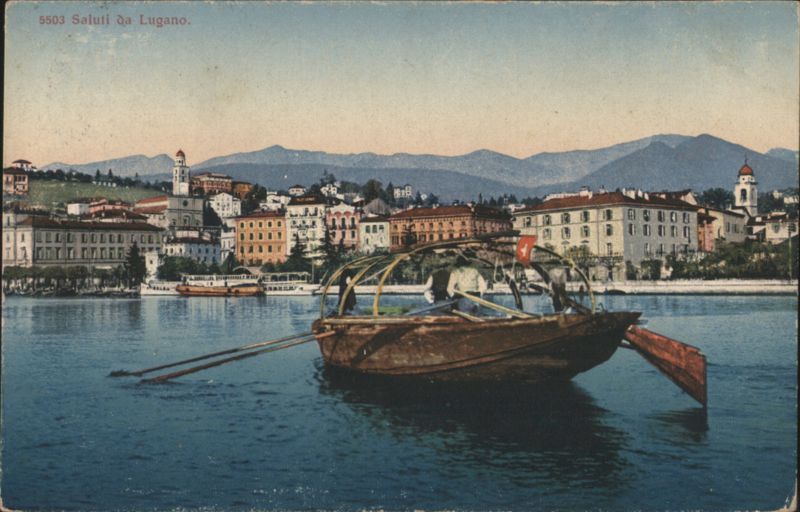 Boat on Lake Lugano with Cityscape Switzerland