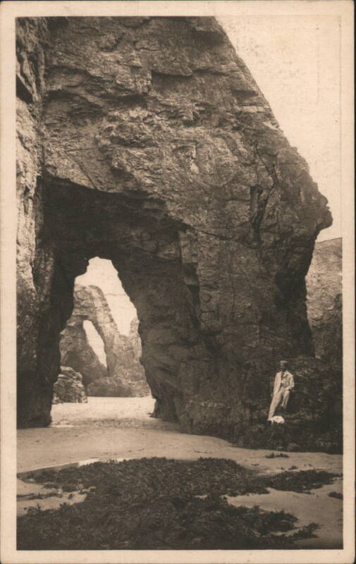 Arched Rocks, Perranporth with Person Standing United Kingdom