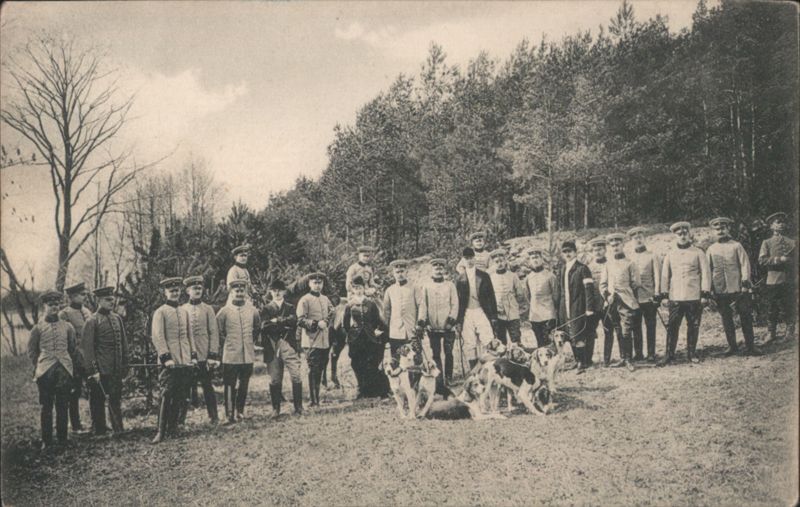 Group of Hunters with Hounds in Forest Hunting