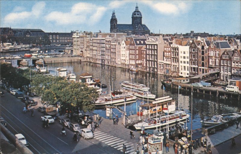 Amsterdam Canal Tour Boats on Damrak Netherlands
