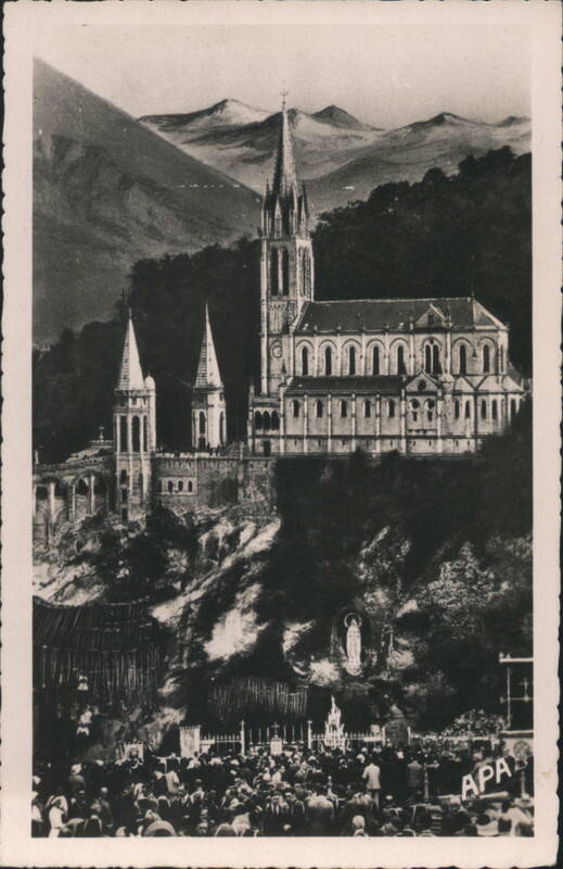 Lourdes Basilica and Grotto with Mountains and Crowd France