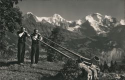 Swiss Postcard: Alphorn Players, Eiger, Mönch & Jungfrau Postcard