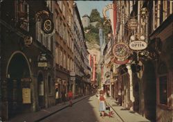 Getreidegasse, Salzburg with Mönchsberg Castle View Postcard