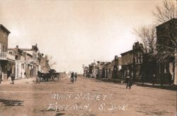 Main Street with First National Bank, Freeman, SD, 1920s Postcard