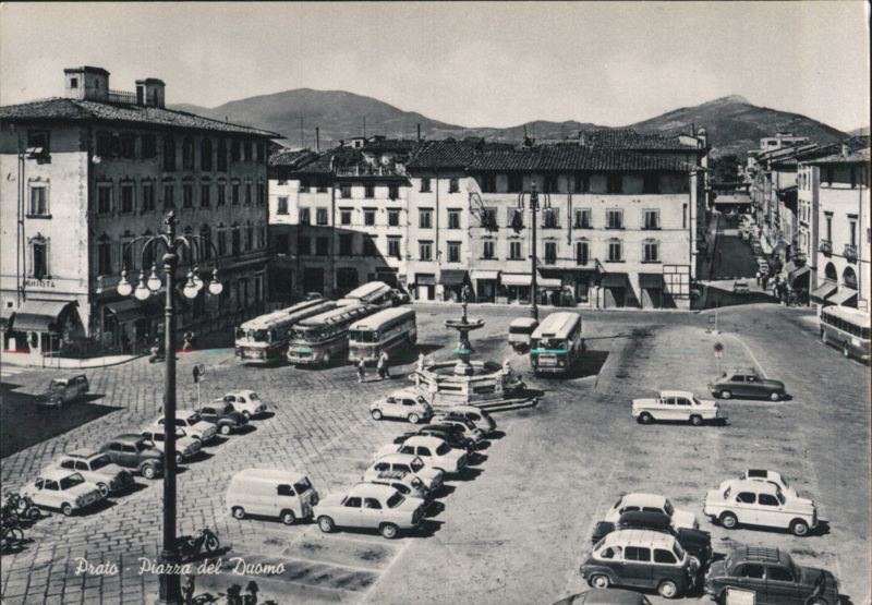 Prato Piazza del Duomo, Fountain, Buses, Cars Italy