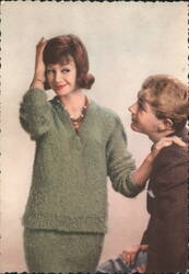 Two women, green sweater, fashion, garment making challenges Postcard