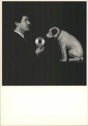 Stuart Redler: Man Holding CD Looking at Nipper Dog Statue Postcard