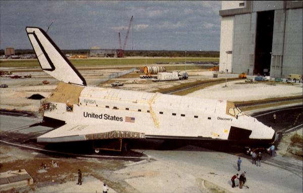 Space Shuttle Discovery is towed to the Vehicle Assembly Building