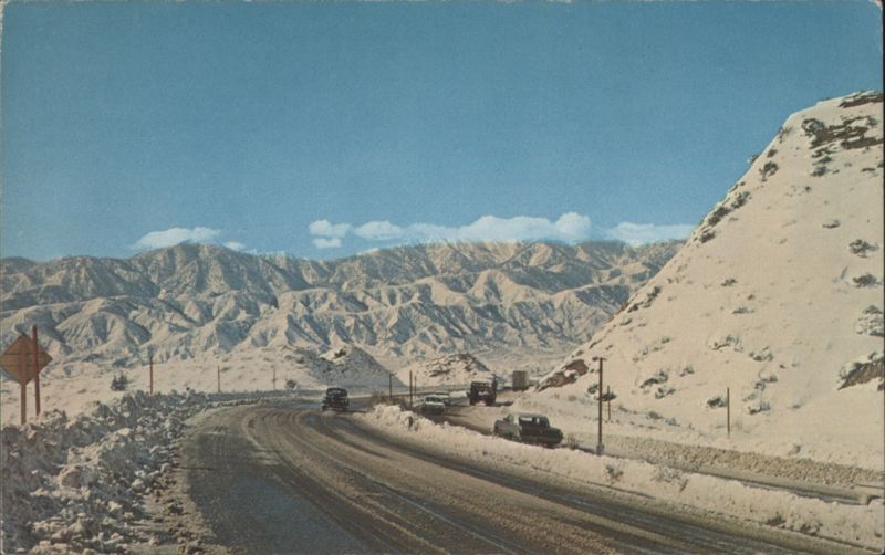 Winter Cajon Pass, Snow Covered Mountains & Road California