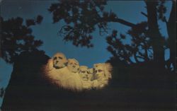 Mt. Rushmore National Memorial Illuminated at Night Postcard
