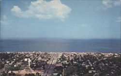 Rehoboth Beach DE Business District & Atlantic Ocean Postcard