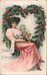Merry Christmas Woman with Holly Wreath, Doll, Teddy Bear & Gifts Postcard
