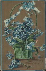 Blue Forget-Me-Nots in Basket with "A Merry Christmas" Greeting Postcard