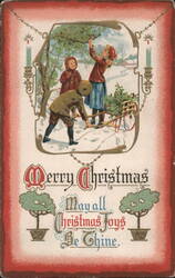 Merry Christmas Children Gathering Tree in Snow with Festive Greeting Postcard