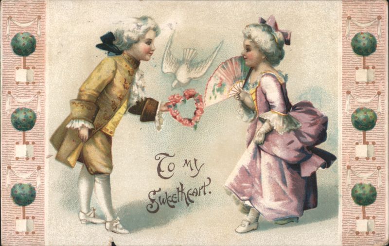 Children in Period Costumes Exchanging Valentine Heart Wreath