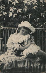 Young Girl in Hat with Three Cats on a Bench Postcard