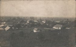 Elevated View of a Town with Church Steeples Postcard