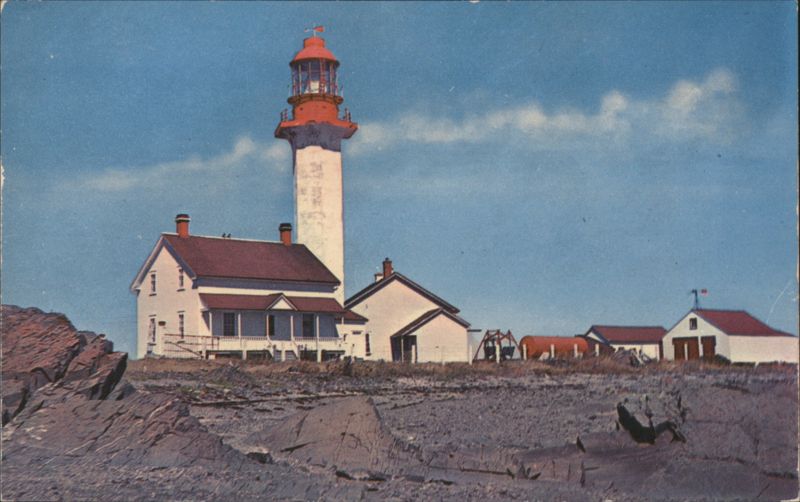 Picturesque Lighthouse at Metis Beach, Gaspé PQ Canada