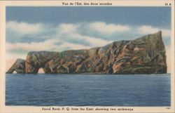 Percé Rock, showing two archways from the East Postcard