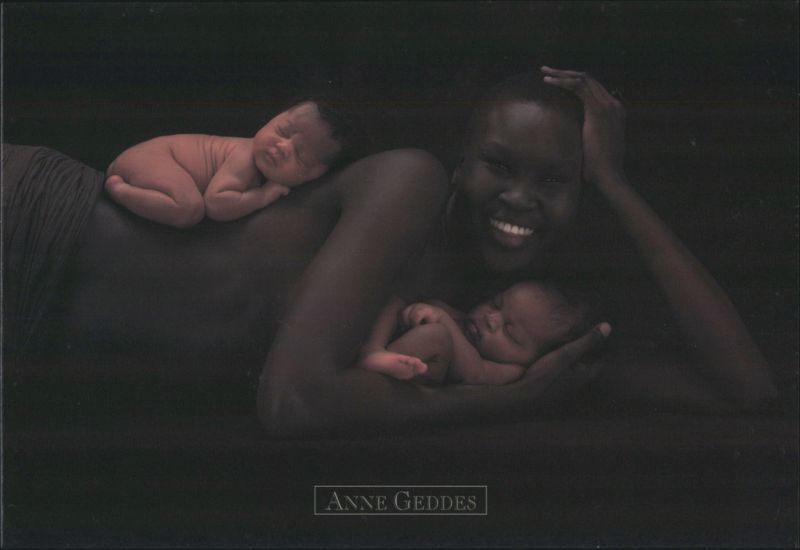 Smiling Woman with Two Newborn Babies Anne Geddes