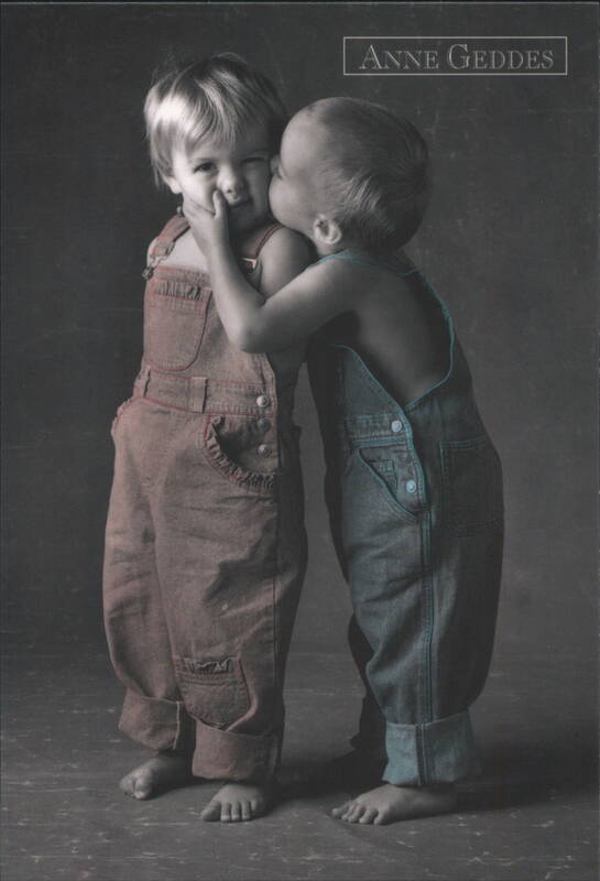 Anne Geddes: Toddlers in Overalls Kissing Babies