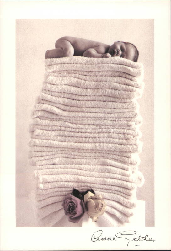 Sleeping Baby on Stack of White Towels with Roses Babies