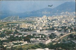 Kowloon City, Kai Tak Airport Cityscape with Plane Postcard