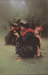 Thai Women & Baby in Traditional Attire Postcard