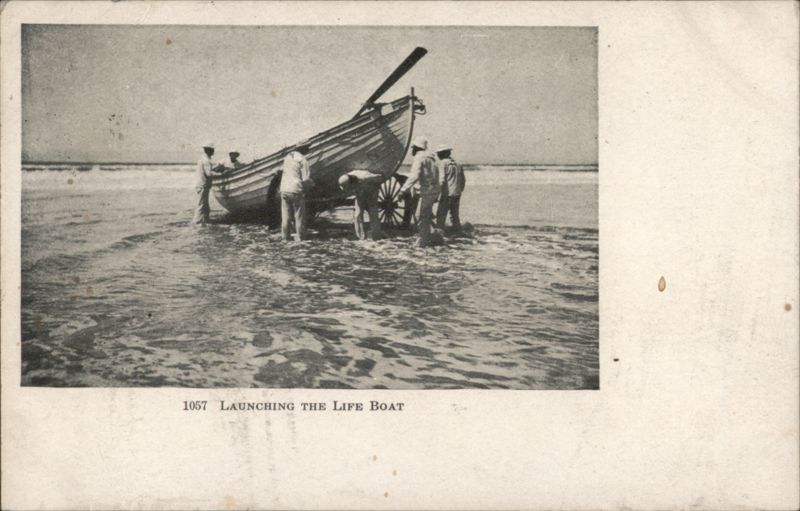Launching the Life Boat - Crew Pushing Boat into Surf Washington
