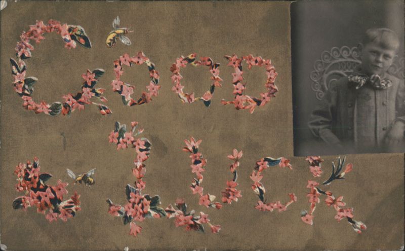 Good Luck message formed by pink flowers with bees and a young boy's portrait