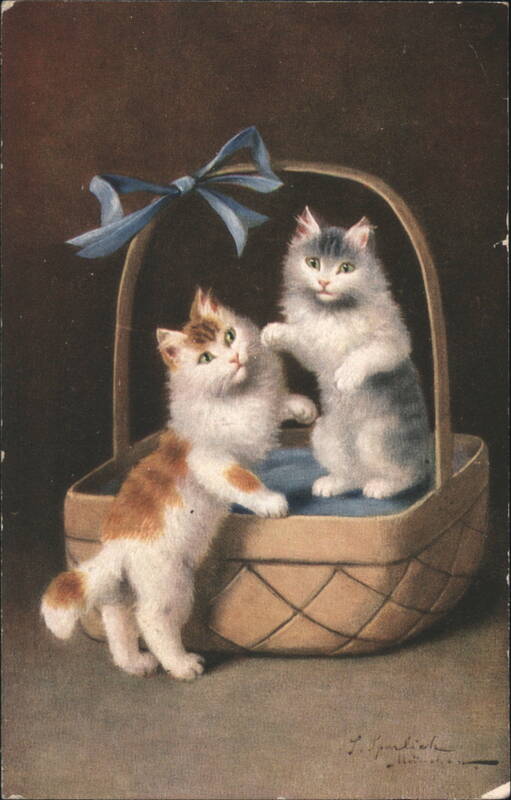 Two Fluffy Kittens Playing in Wicker Basket with Blue Ribbon