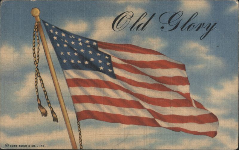 Old Glory American Flag with 48 Stars Waving in Sky