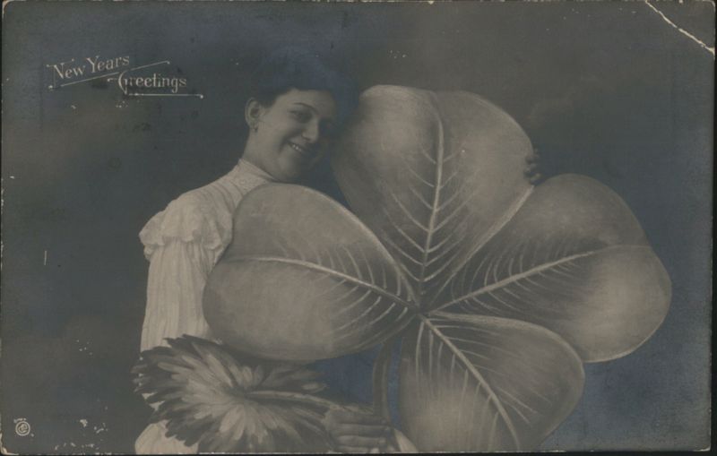 Woman with Giant Four-Leaf Clover, New Year's Greetings