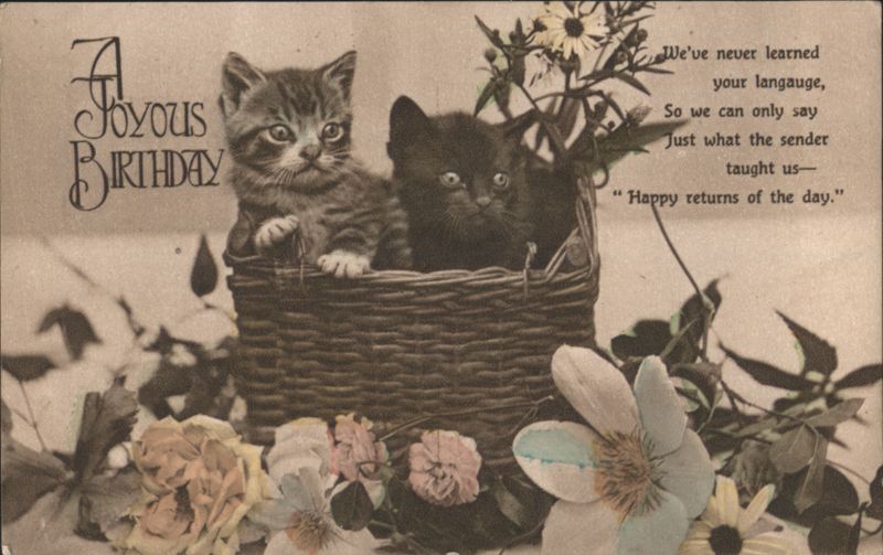 A Joyous Birthday Greeting with Two Kittens in a Basket and Flowers