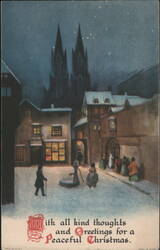 Snowy Christmas Eve Street Scene with Church Spires Postcard