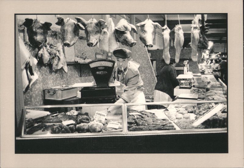Butcher Shop with Hanging Pig Heads, Paris France Daniel Lebée